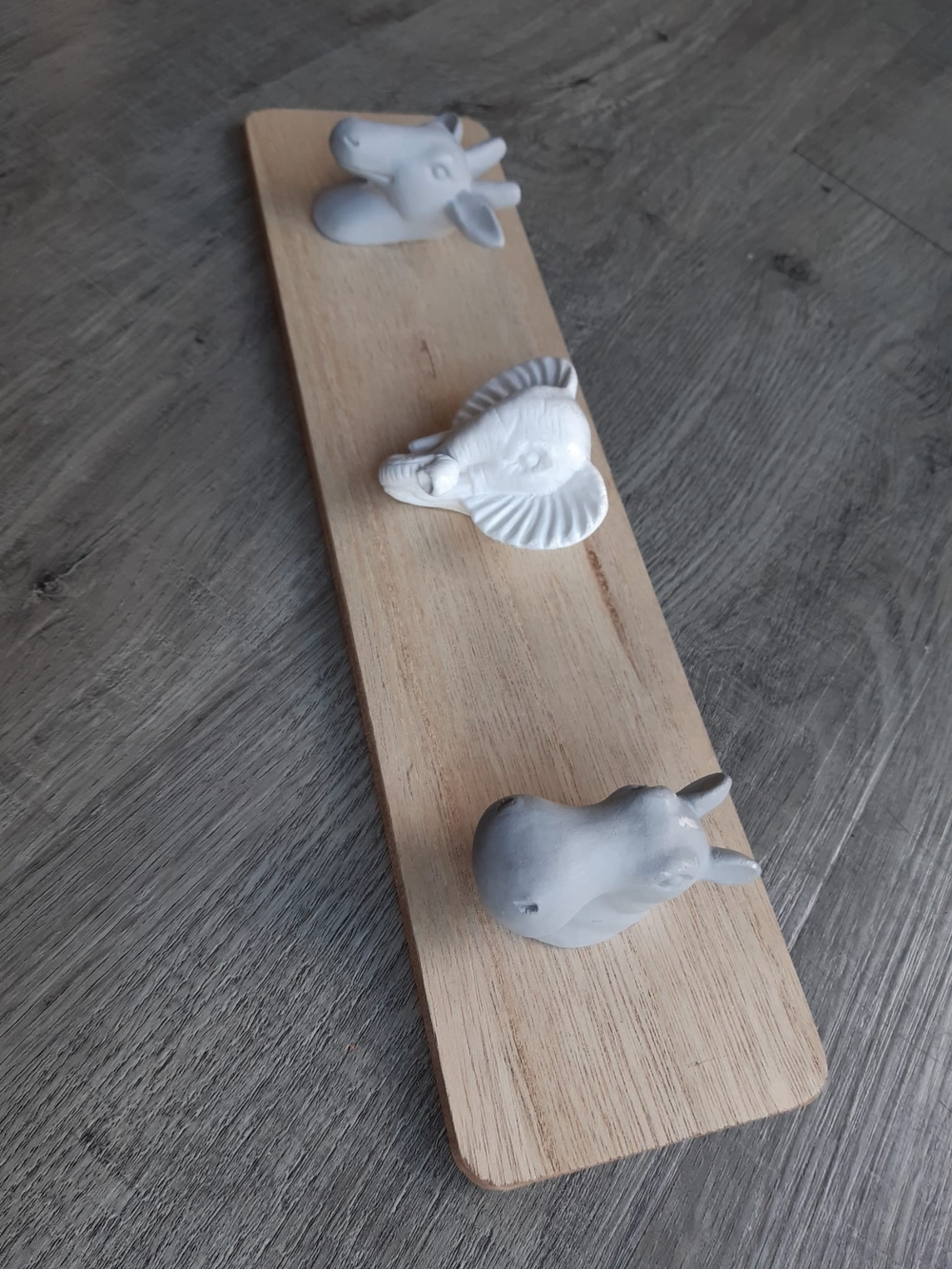 Ceramic Animal Wall Hooks on Wood